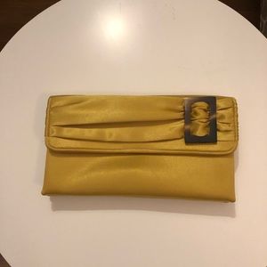 Vintage gold satin clutch with tortoise accent